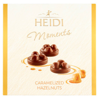 Heidi Moments tejcsokoládé praliné pralinékrém töltelékkel és egész karamellizált mogyoróval | Rubik kocka
